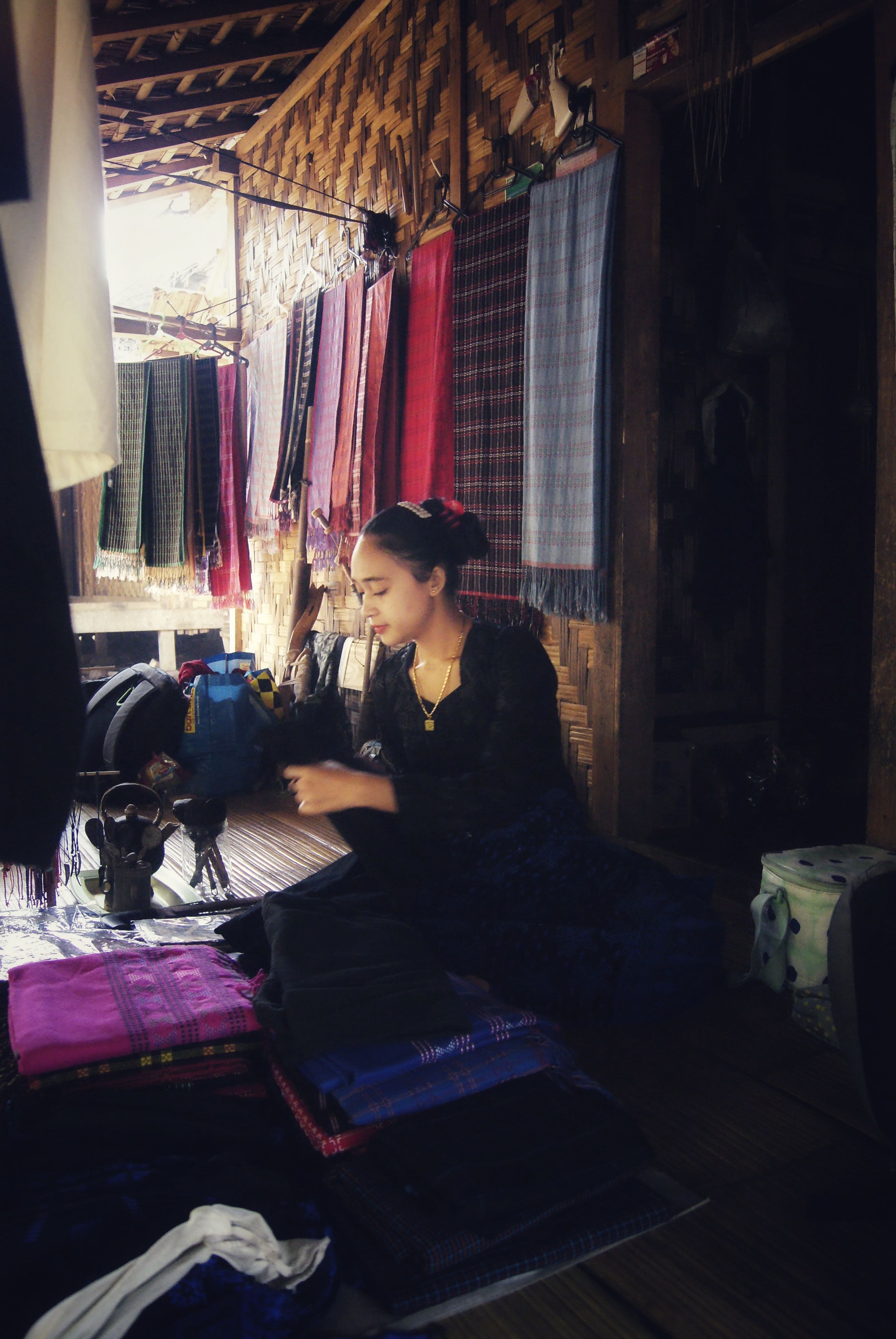 Traditional Market Stall with Local Textiles · Free Stock Photo