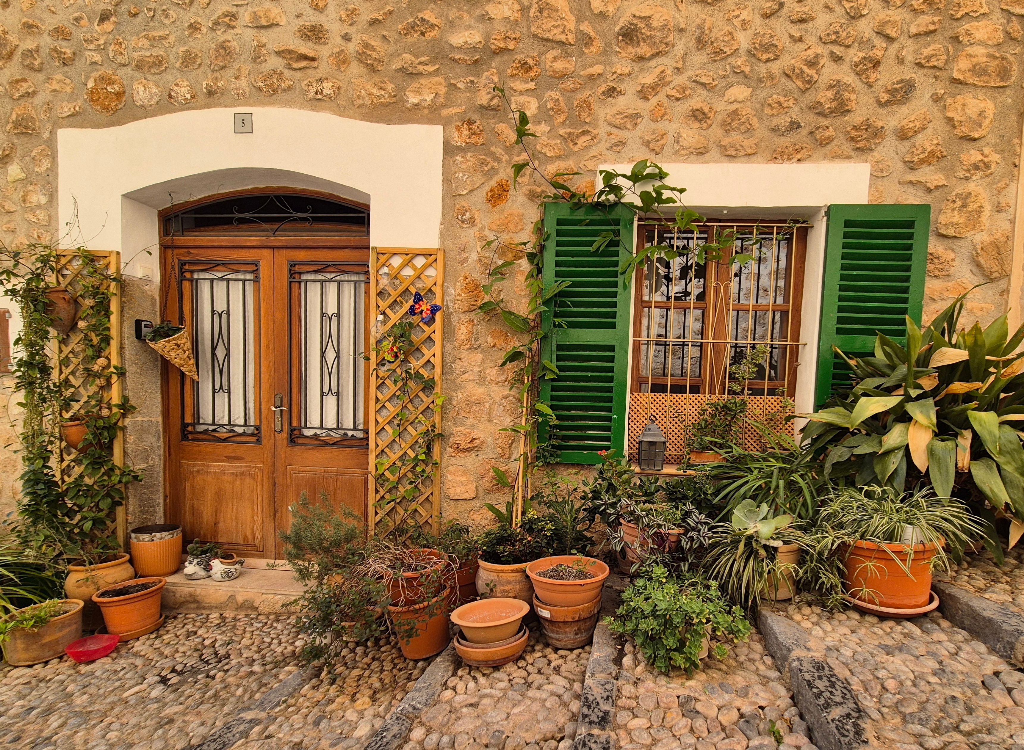 Charming Stone House with Green Shutters · Free Stock Photo