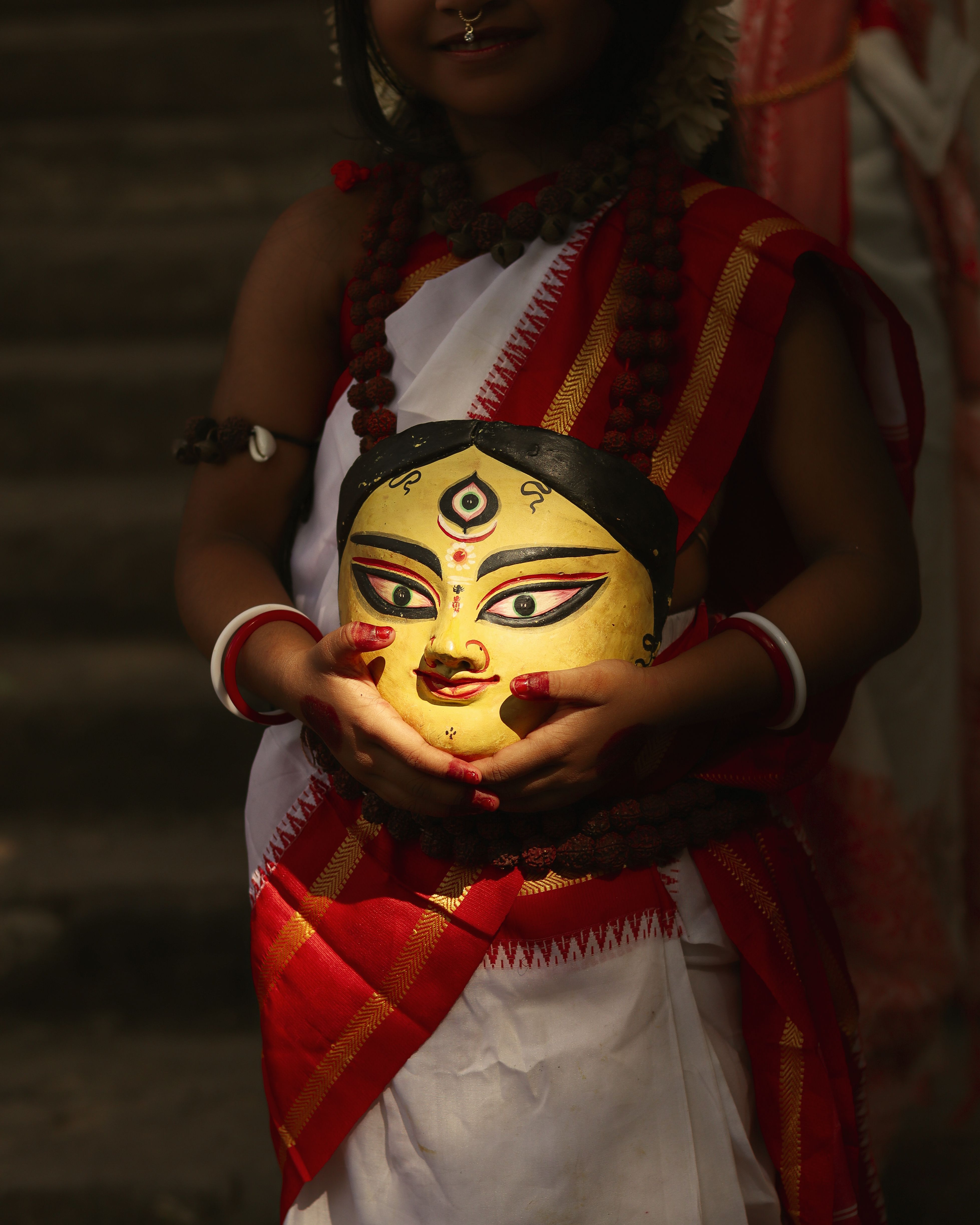 Child Holding Traditional Bengali Mask Celebrating Culture · Free Stock ...