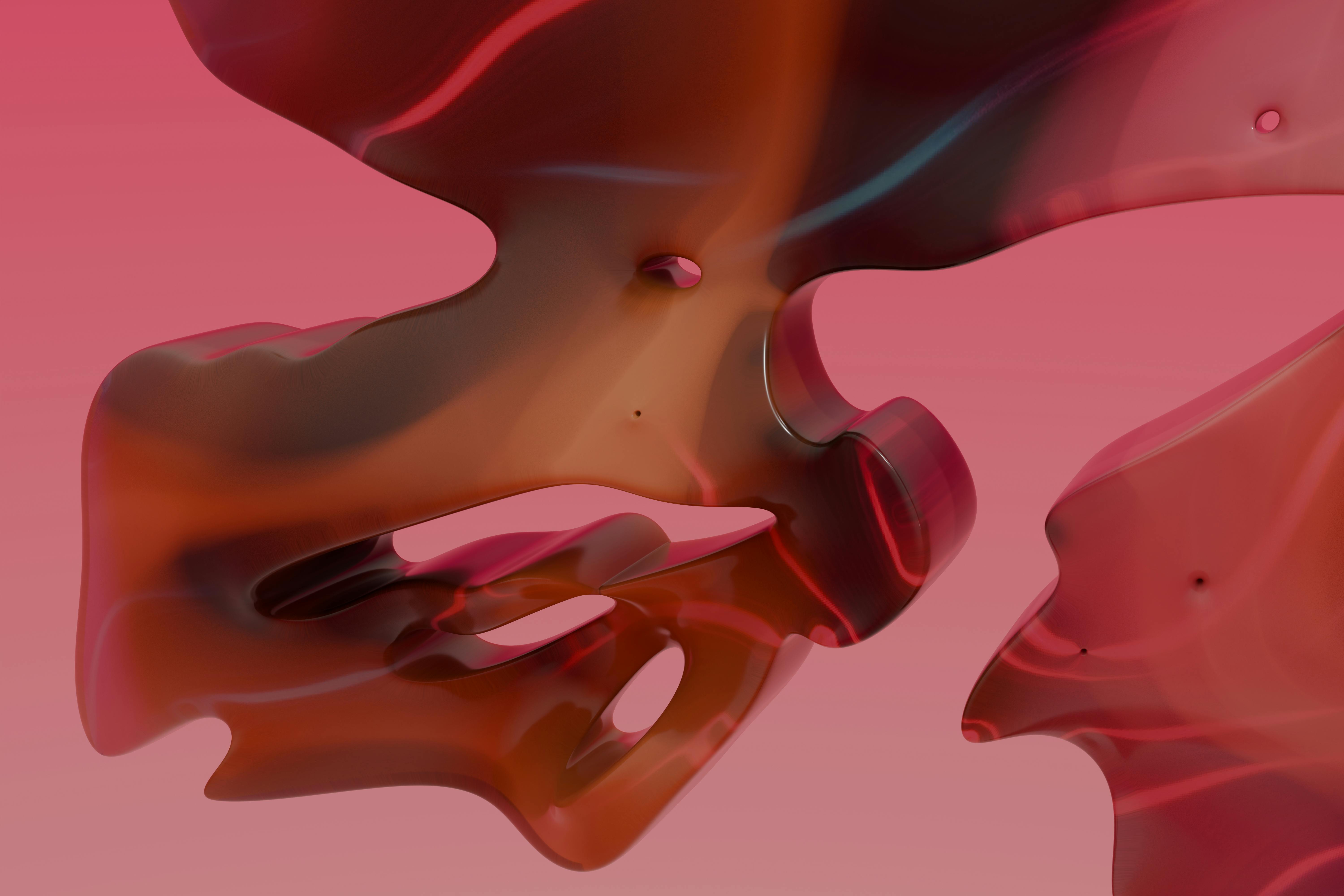 Fluid abstract design with smooth curves rendered in warm red and brown tones.