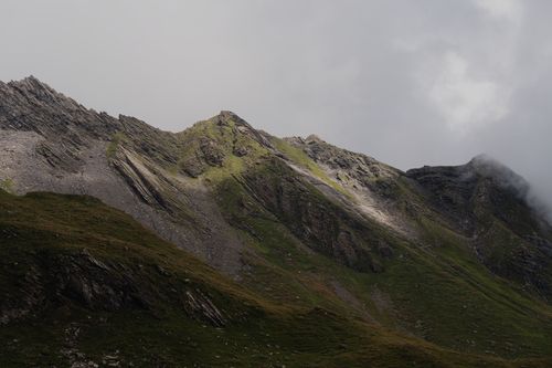 Free A dramatic view of the rugged mountain peaks in Grindelwald, Switzerland. Stock Photo