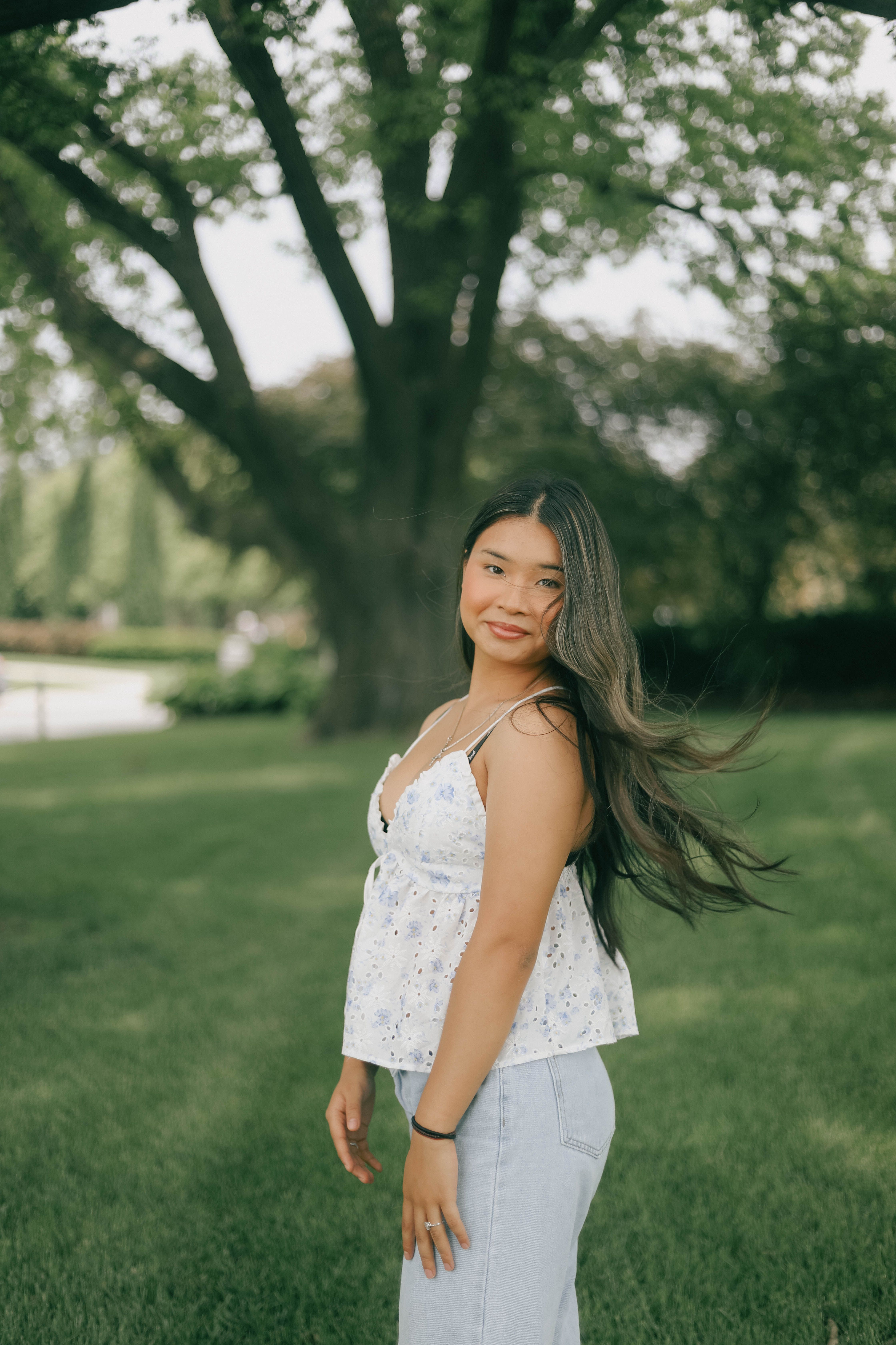 Young Woman Posing Outdoors in Casual Wear · Free Stock Photo