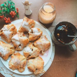 Flaky fruit pastries on a table — photo by Katrin Wood on Pexels