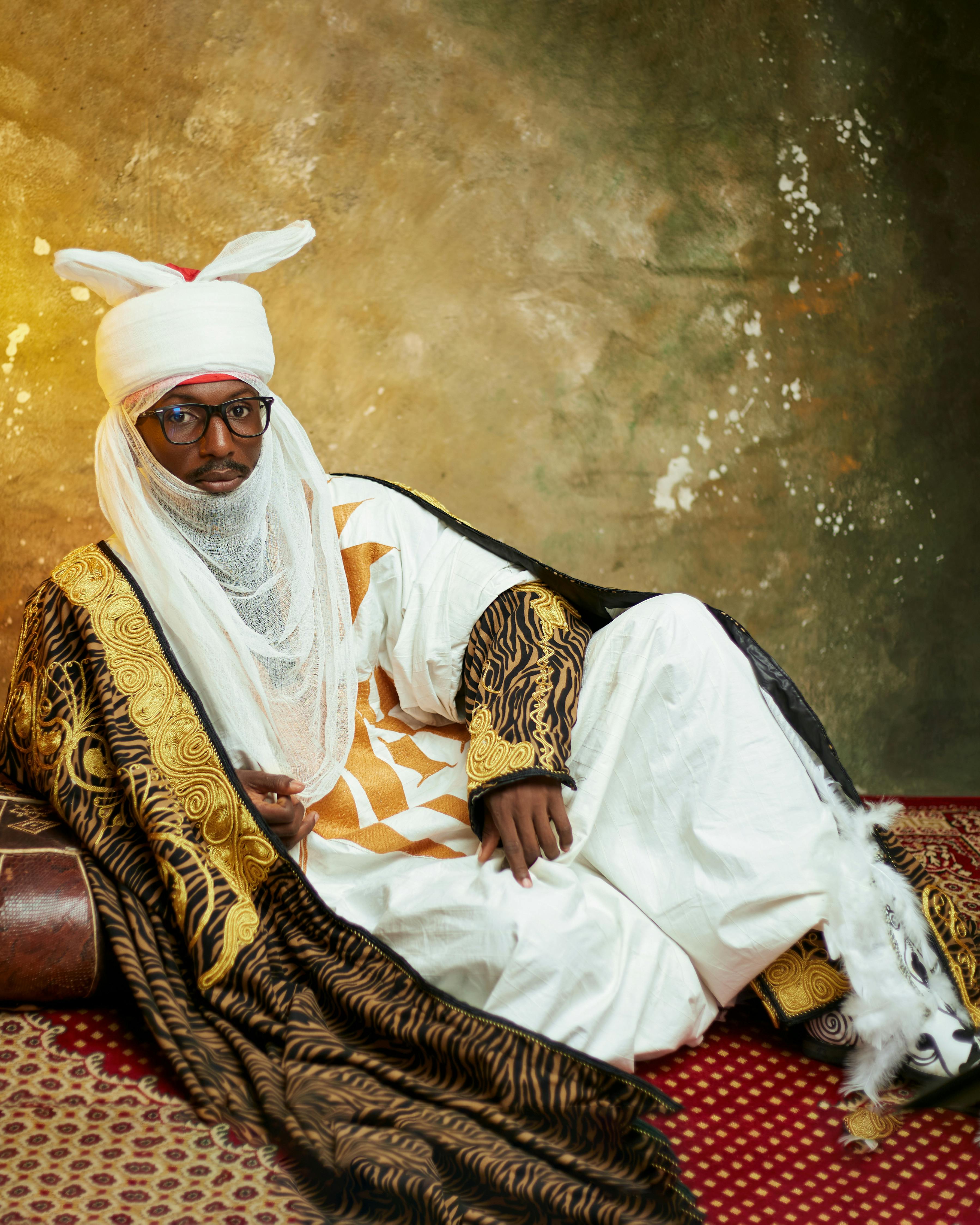 Elegant portrait of a man in traditional Nigerian attire, showcasing rich cultural heritage.