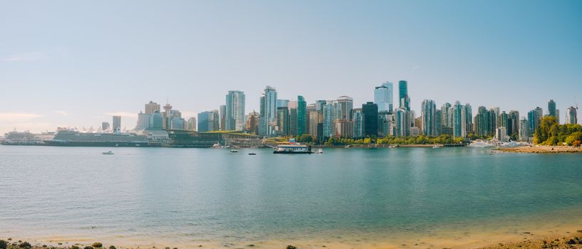 Explore the stunning Vancouver skyline with a picturesque waterfront. Perfect for travel and cityscape enthusiasts.