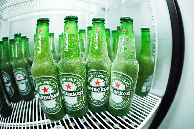 Green Heineken Bottle In Refrigerator