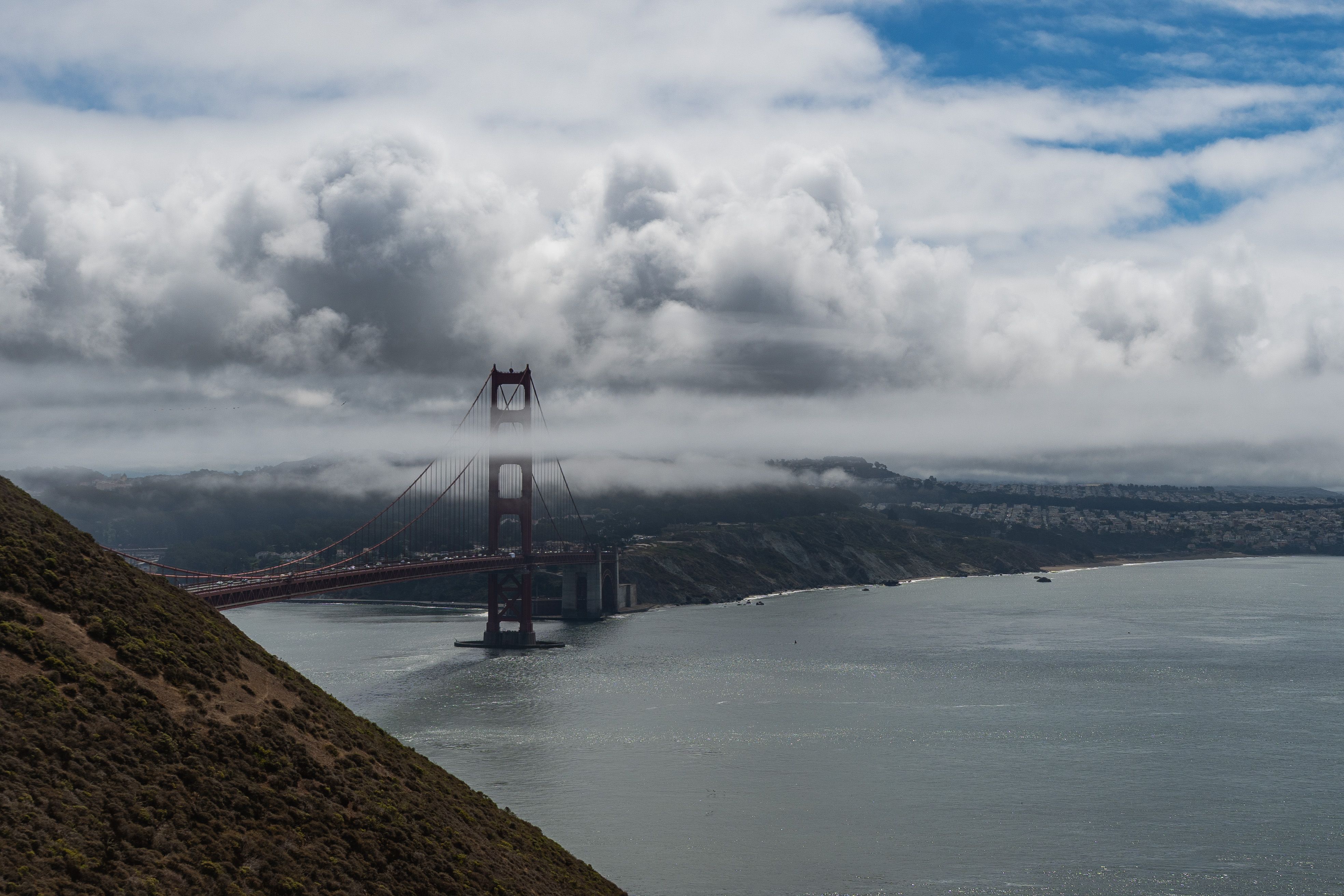 Stunning view of Golden Gate Bridge under clouds · Free Stock Photo