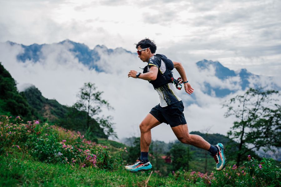 Runner on a misty mountain trail — photo by VANNGO Ng on Pexels