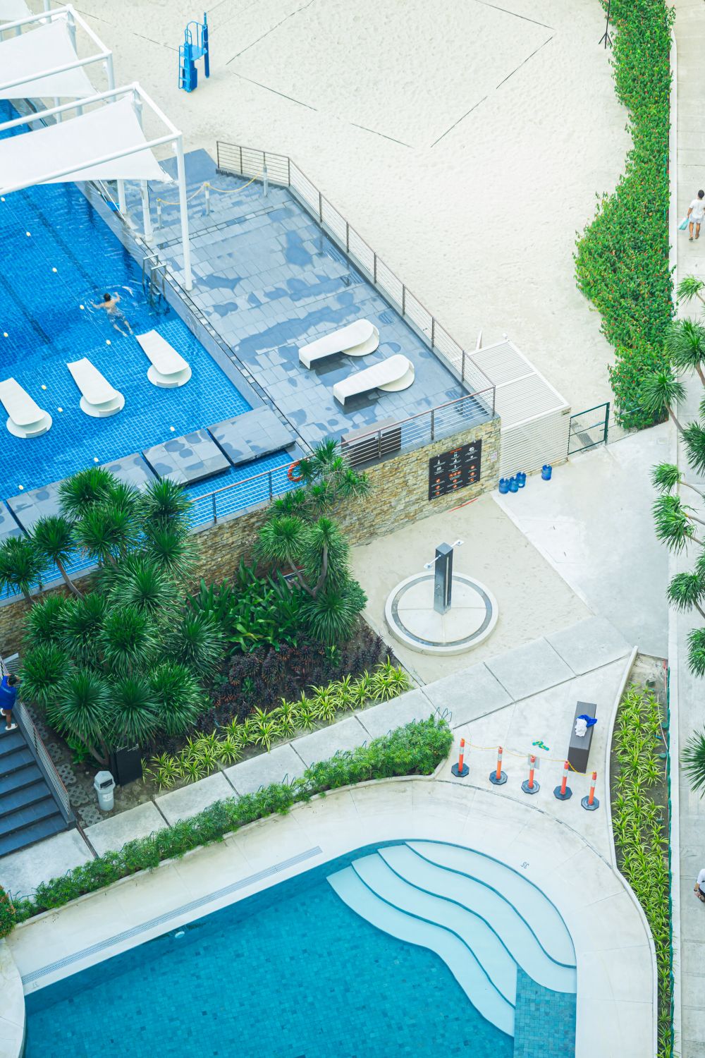 Aerial View of Modern Swimming Pool Area · Free Stock Photo