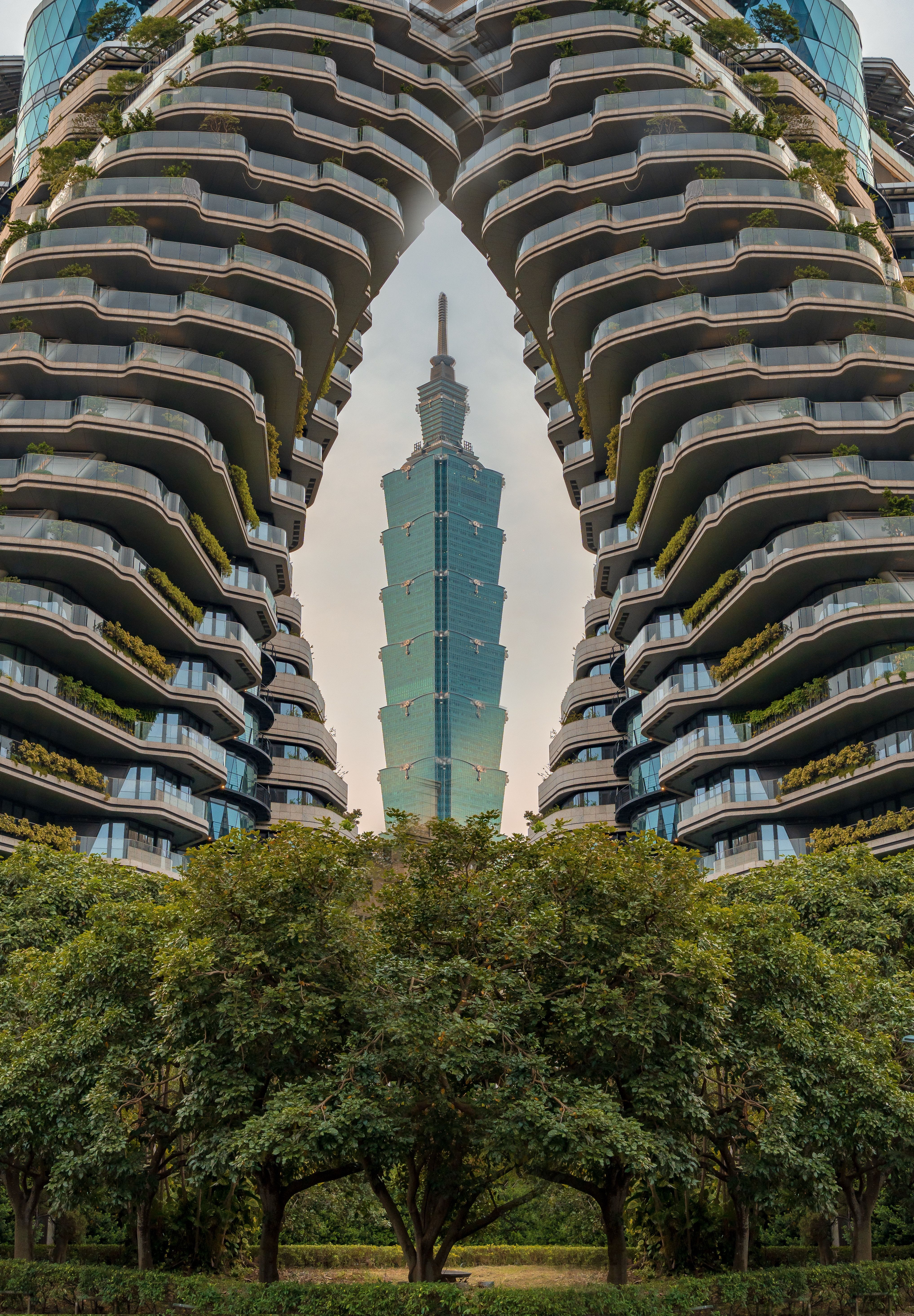 Taipei 101 Framed by Modern Architecture · Free Stock Photo