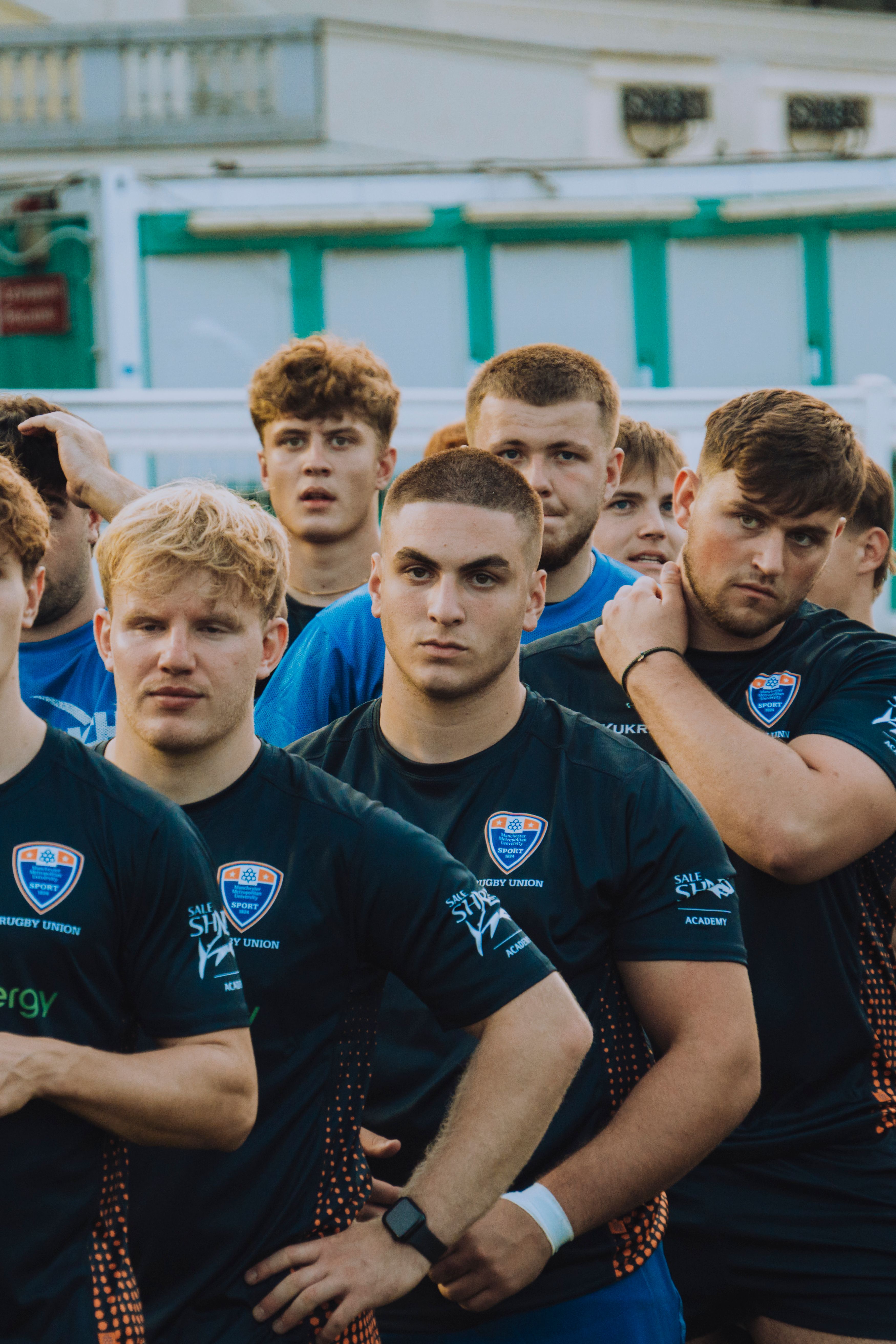 Team Huddle of Young Rugby Players Outdoors · Free Stock Photo