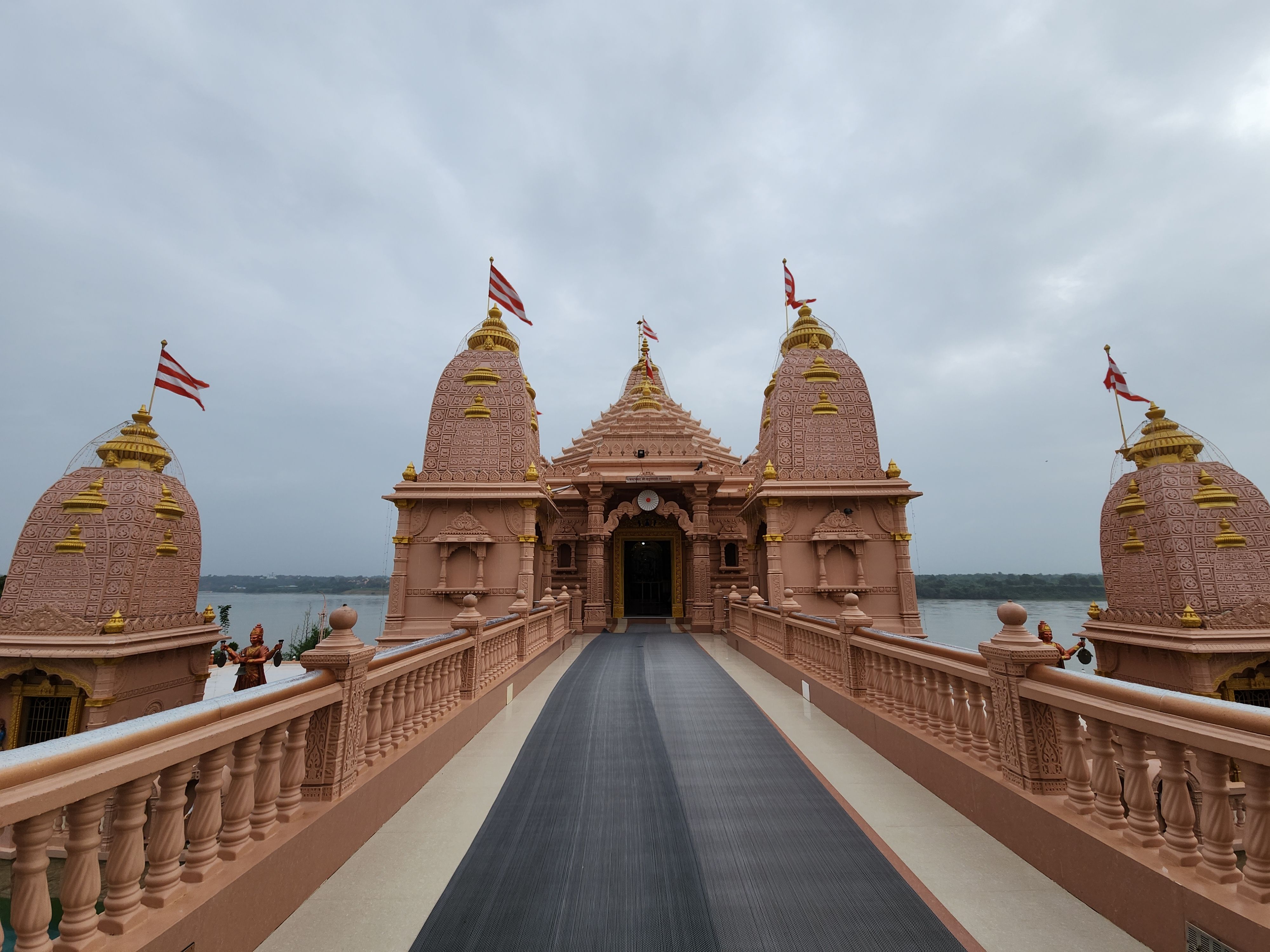 Magnificent Temple with Ornate Architecture and Flags · Free Stock Photo