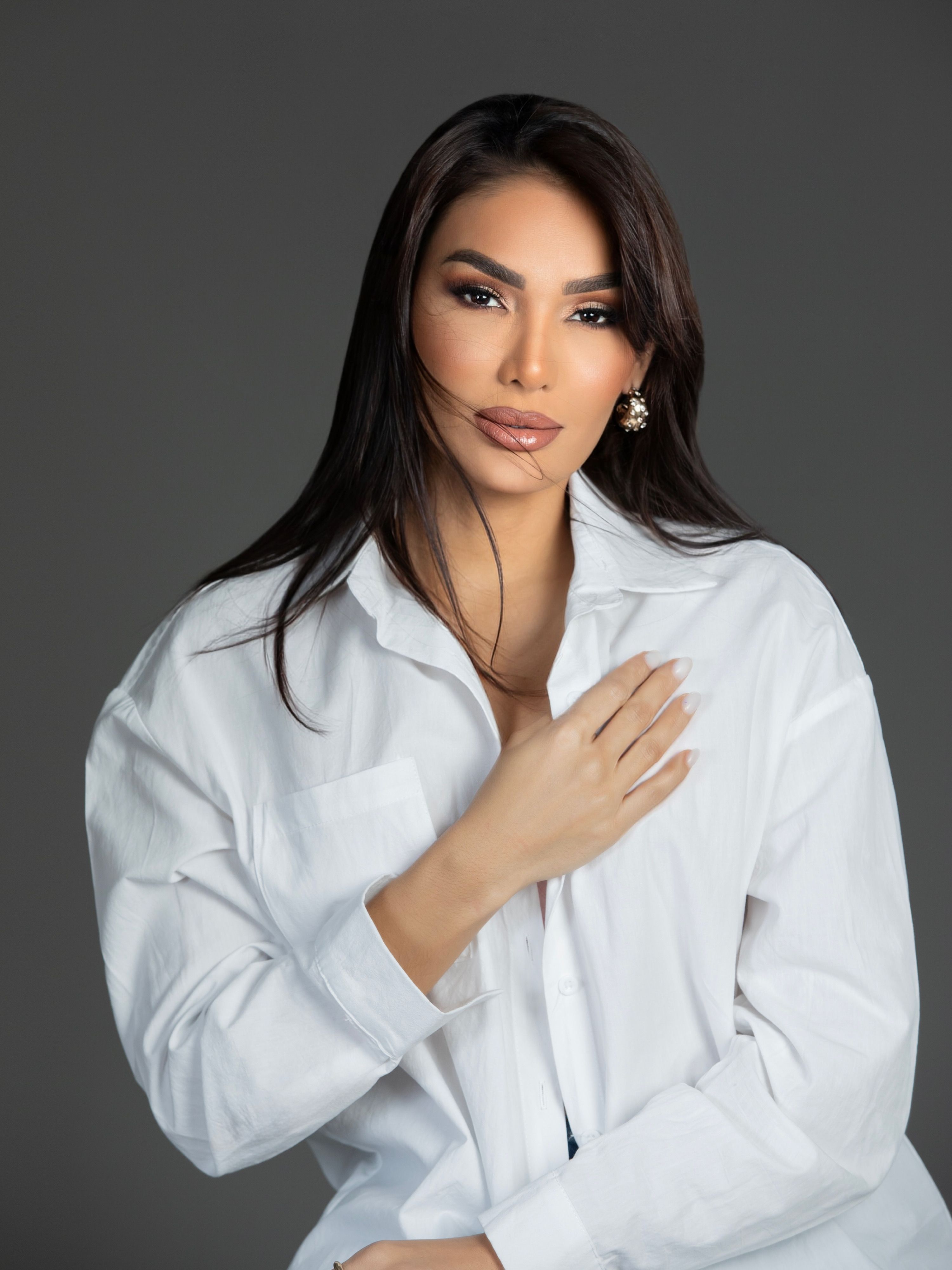 Elegant Portrait of Woman in White Shirt · Free Stock Photo