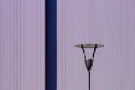 Modern Lamp Against Striped Wall Pattern