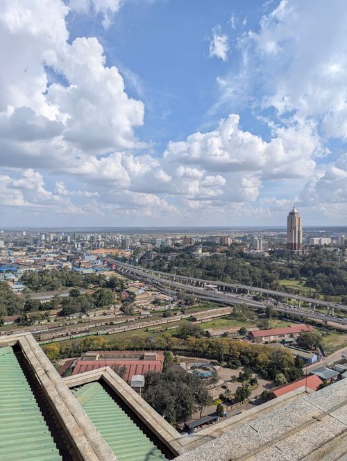 Free Stunning aerial view of Nairobi's cityscape under a sky full of cumulus clouds. Stock Photo
