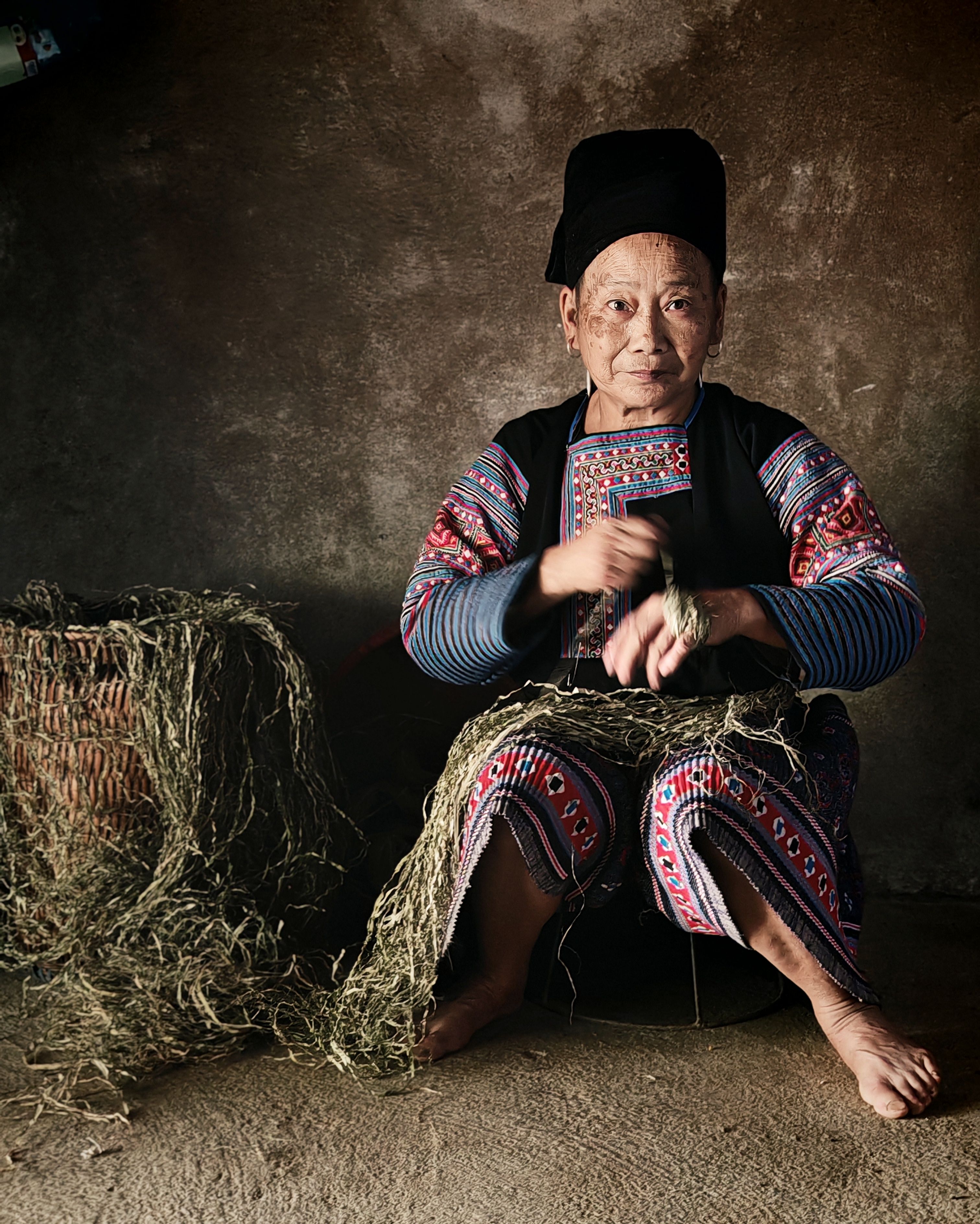 Ethnic Woman Weaving Traditional Clothing Indoors · Free Stock Photo