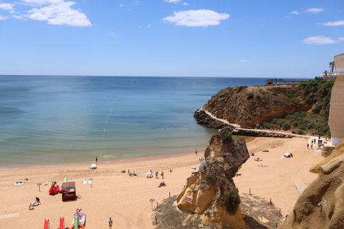 Free Scenic view of Praia da Rocha beach with cliffs and ocean in Algarve, Portugal. Stock Photo