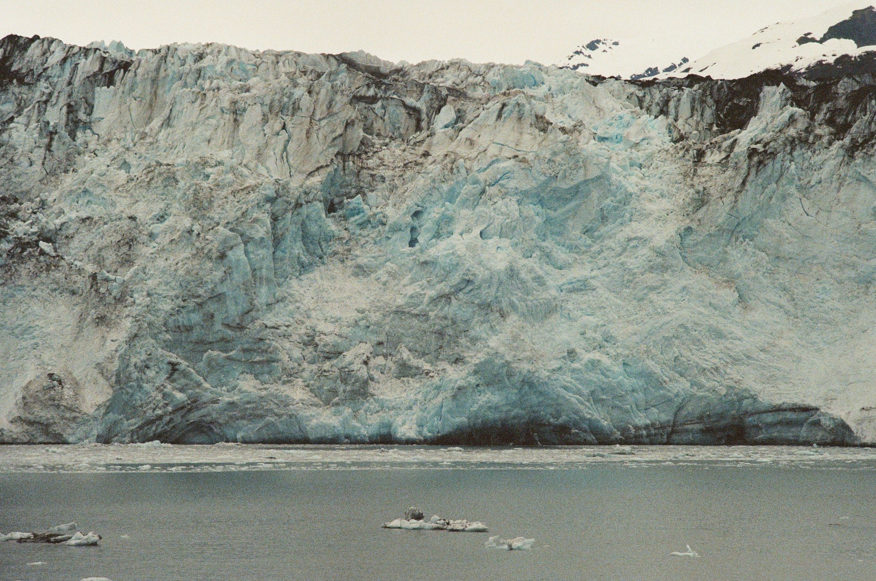 Alaska Helicopter and Glacier Dogsled Tour - ANCHORAGE AREA - Stunning view of a majestic glacier wall, showcasing nature's icy splendor and tranquility.
