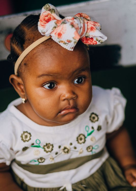 Adorable Baby Girl with Floral Headband · Free Stock Photo