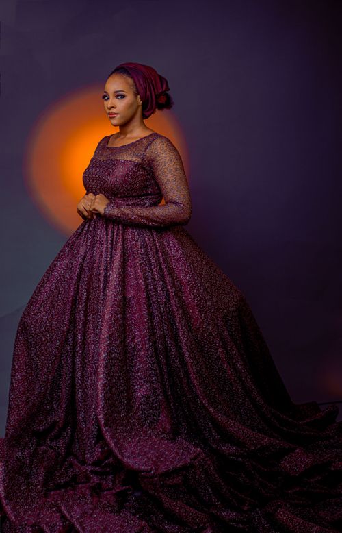 Free Stunning portrait of a woman in traditional Nigerian attire, combining elegance and cultural fashion. Stock Photo