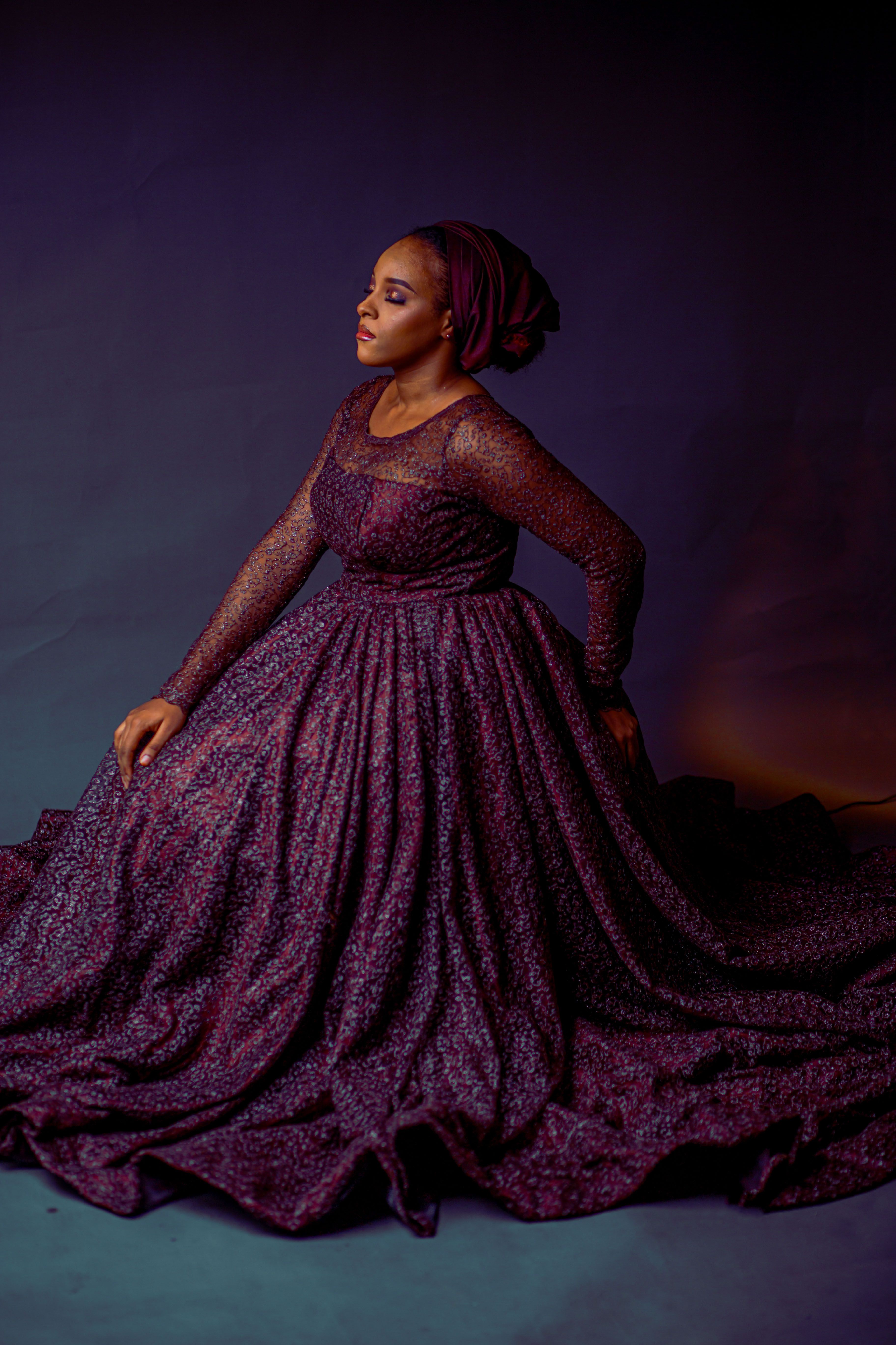 Elegant Nigerian Woman Posing in Traditional Dress · Free Stock Photo