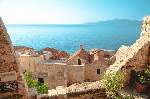 Free Scenic morning view of ancient architecture in Monemvasia, overlooking the serene sea. Stock Photo