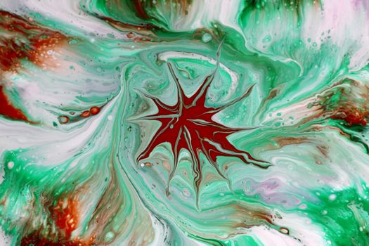 Colorful abstract paint swirl featuring dynamic red star pattern.