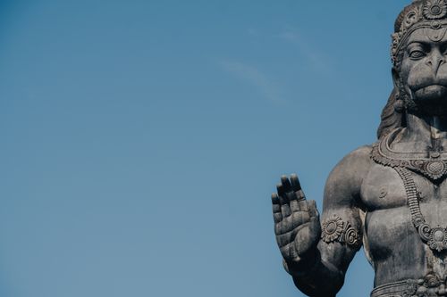 Free Majestic stone statue of Hanuman in Bengaluru, showcasing traditional Hindu artistry. Stock Photo