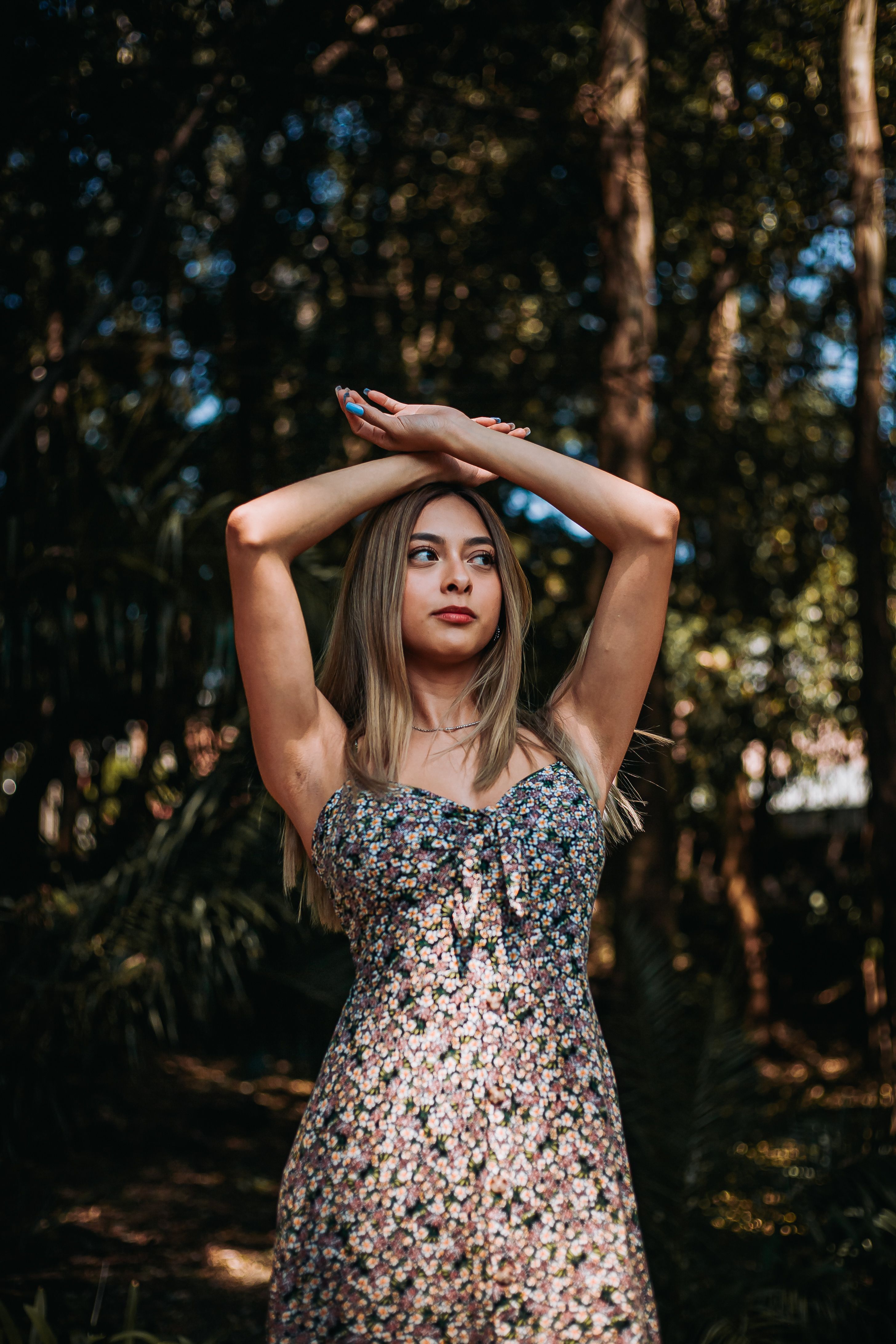 Young Woman Posing in Forest During Daytime · Free Stock Photo