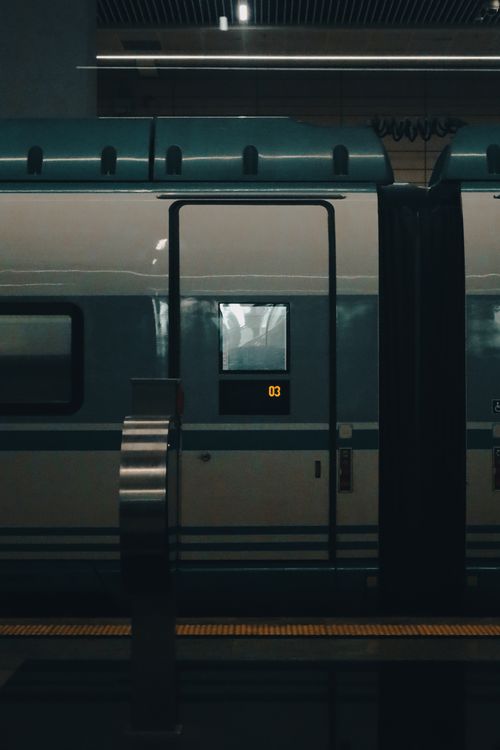 Free A stylish train at Ankara station under soft, ambient lighting, showcasing modern rail travel. Stock Photo