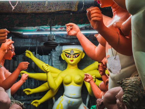 Free Colorful Durga idol creation in Kumartuli workshop, Kolkata, India. Stock Photo