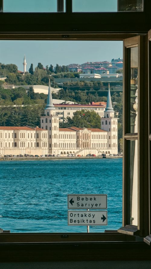 Free A stunning view of Istanbul's iconic architecture from a window, highlighting Kuleli Military School by the Bosphorus. Stock Photo