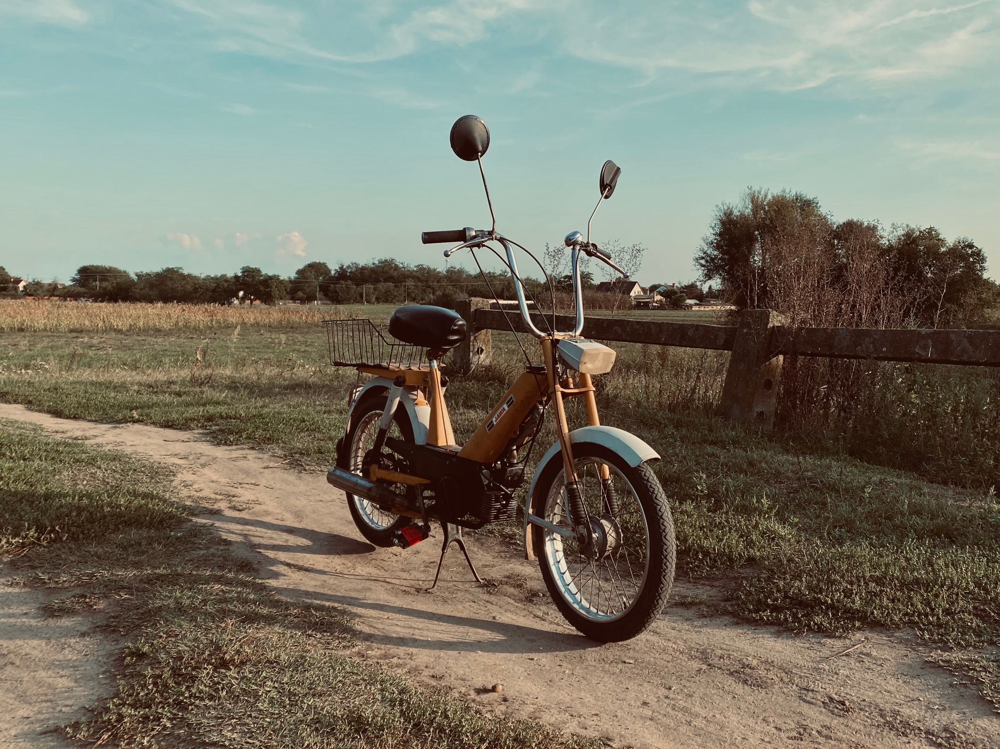 Vintage Retro Motorcycle in Rural Landscape · Free Stock Photo