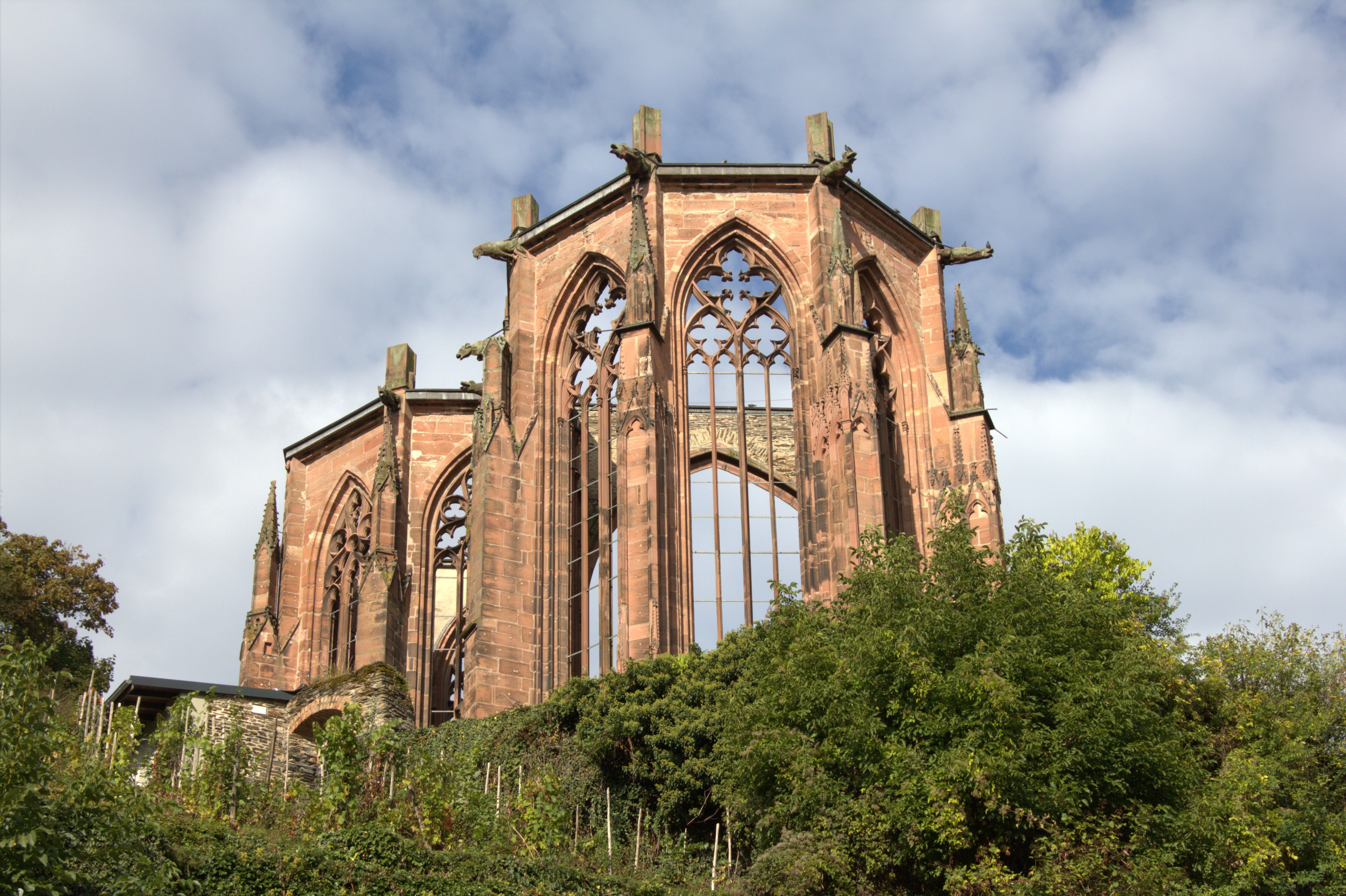 Historic ruins of Werner Chapel, showcasing Gothic architecture against a bright sky in Bacharach, Germany.