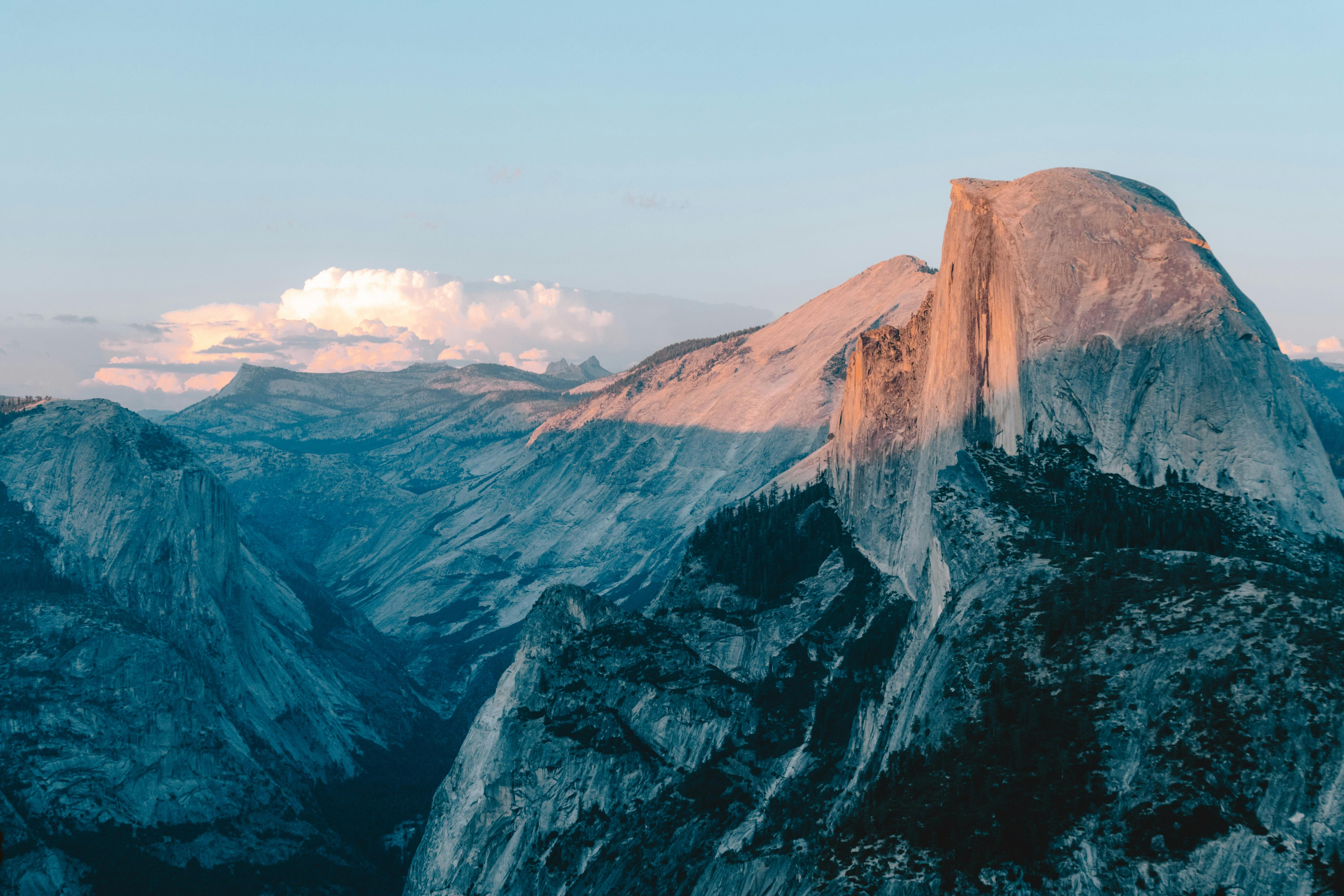 A breathtaking sunset view of the iconic Half Dome in Yosemite National Park.