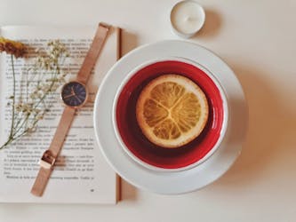Photo Of Tea Cup Beside Watch near Beograd, Serbia