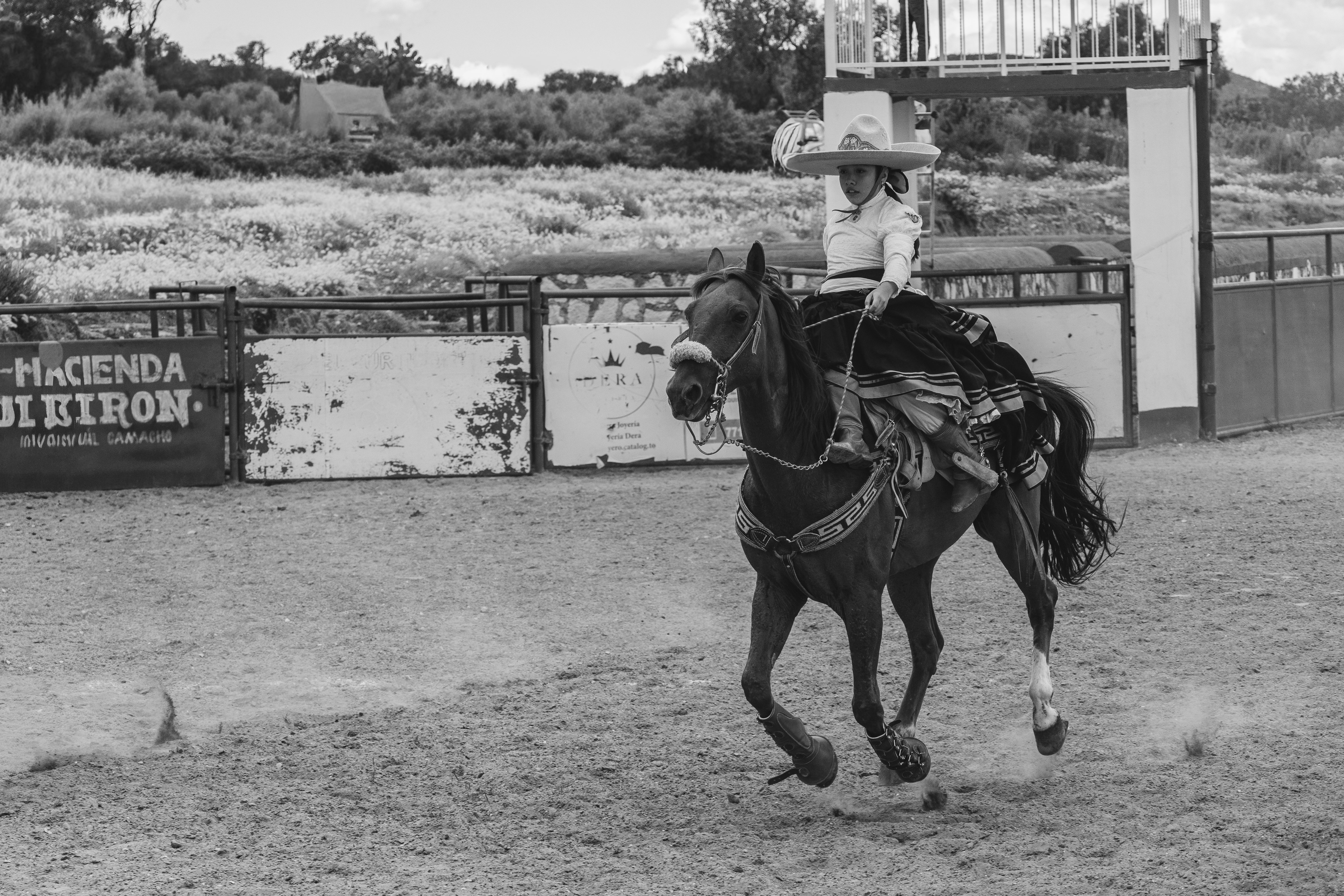 Traditional Mexican Charro Riding in Rural Arena · Free Stock Photo