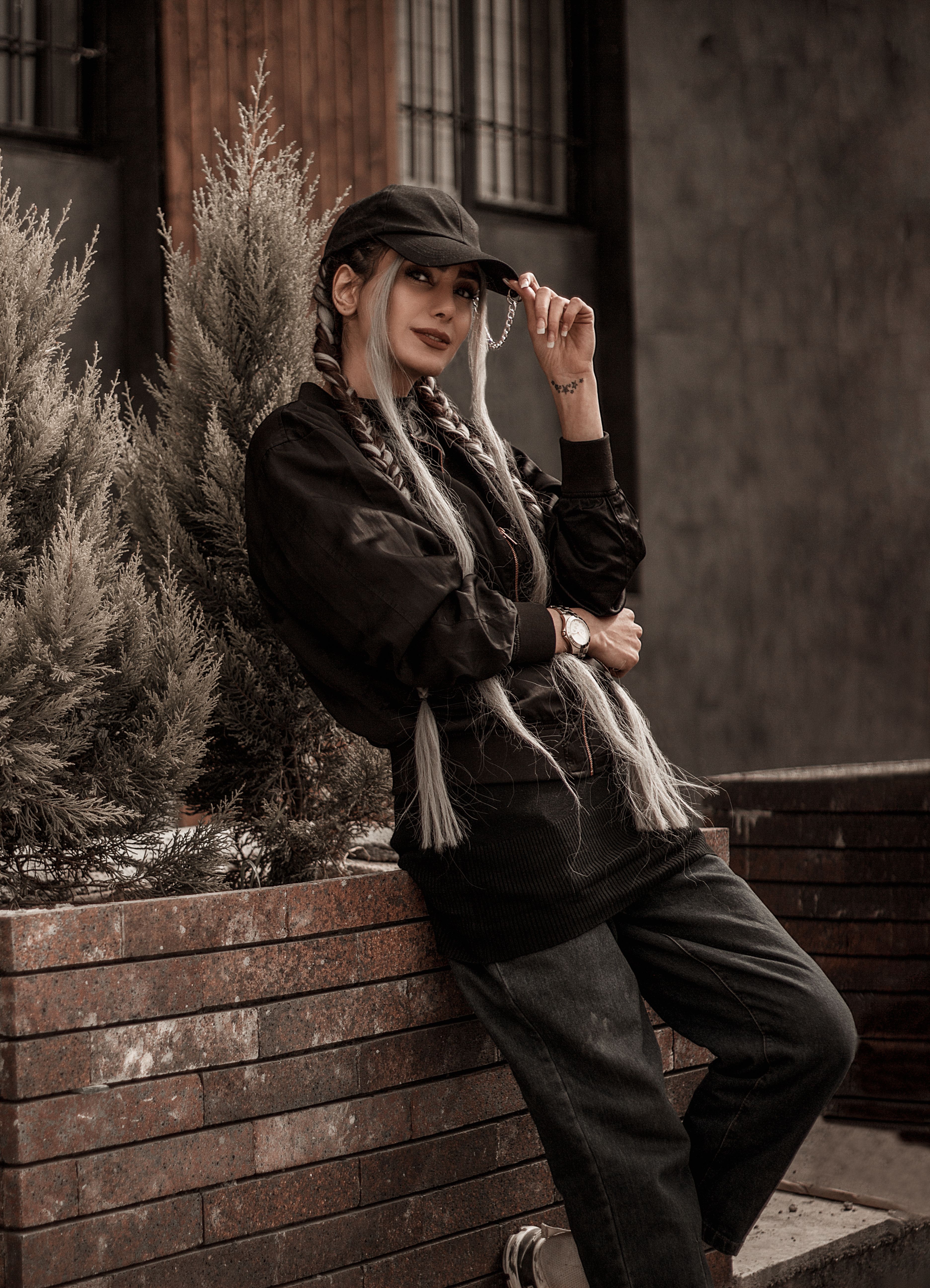 Stylish Woman Posing Outdoors in Urban Setting · Free Stock Photo