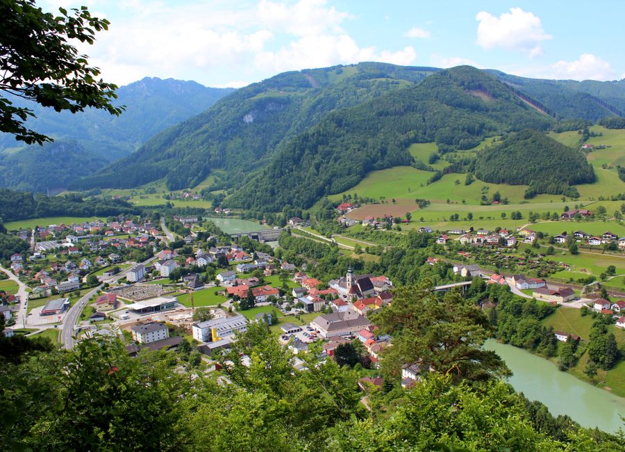 Aerial view of Ternberg, Austria featuring lush landscapes and the Enns River.