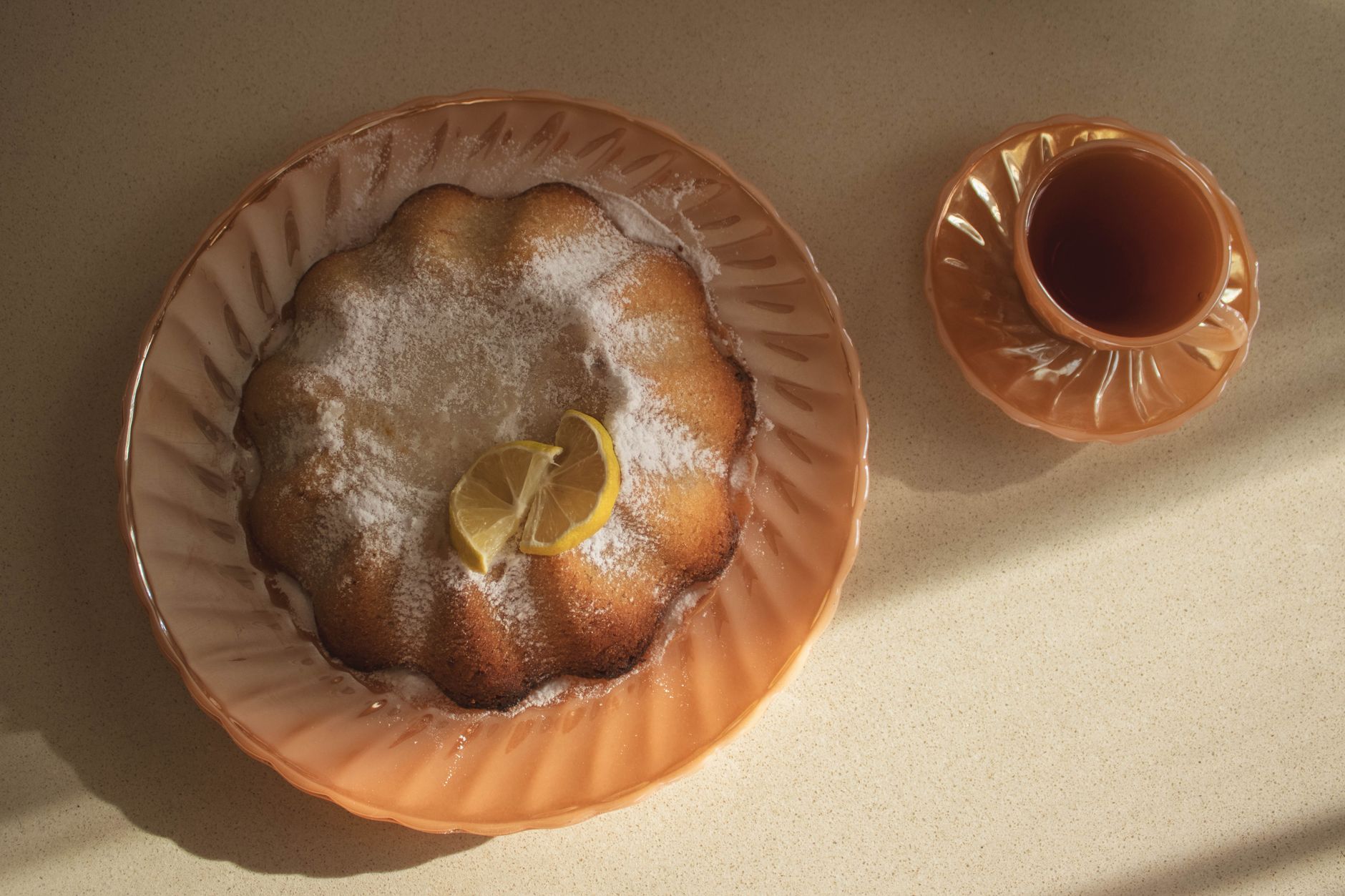Mini tea cakes with Earl Grey icing on cooling rack