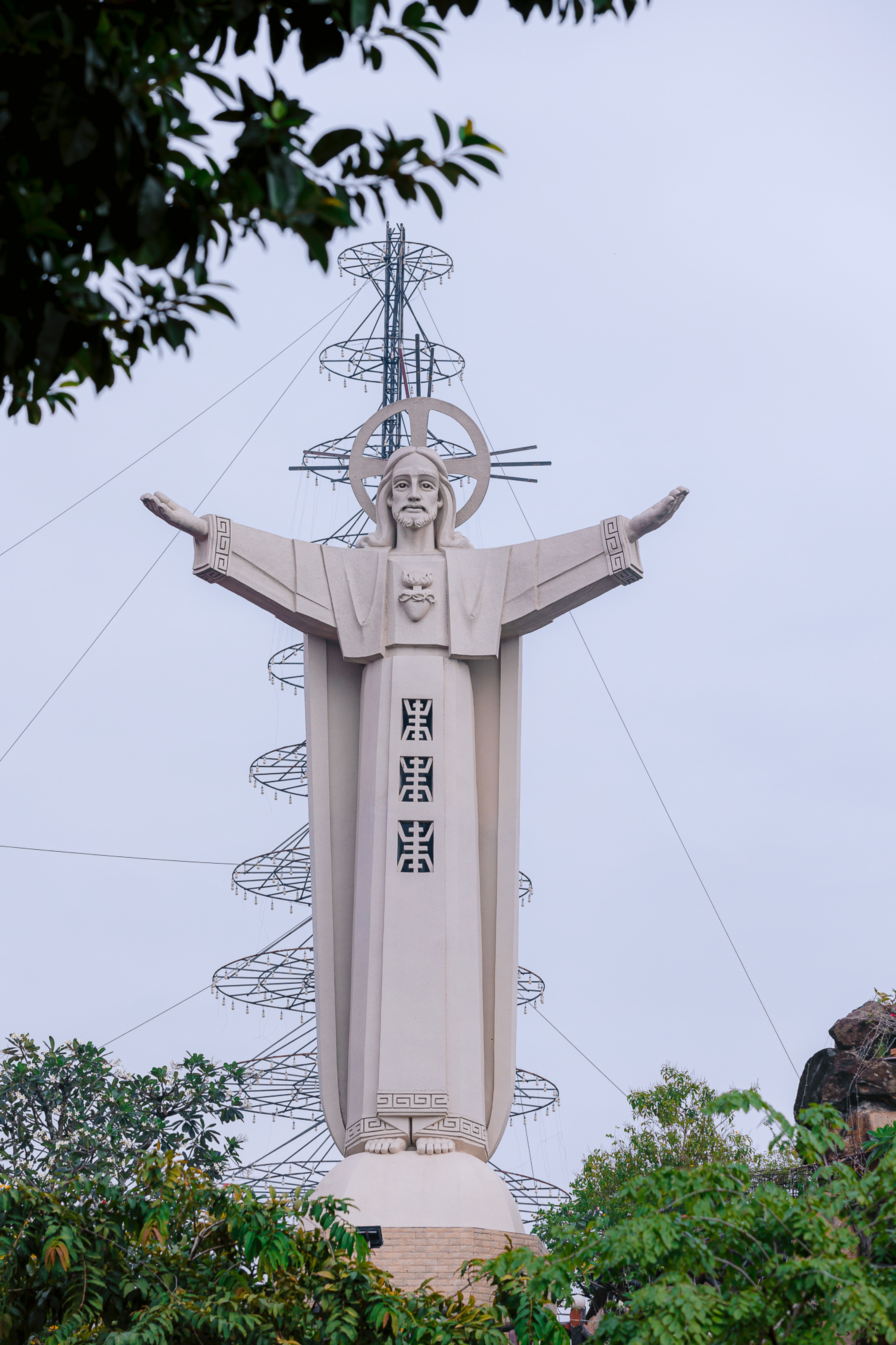 A towering statue of Christ the King with open arms in Vung Tau, Vietnam.