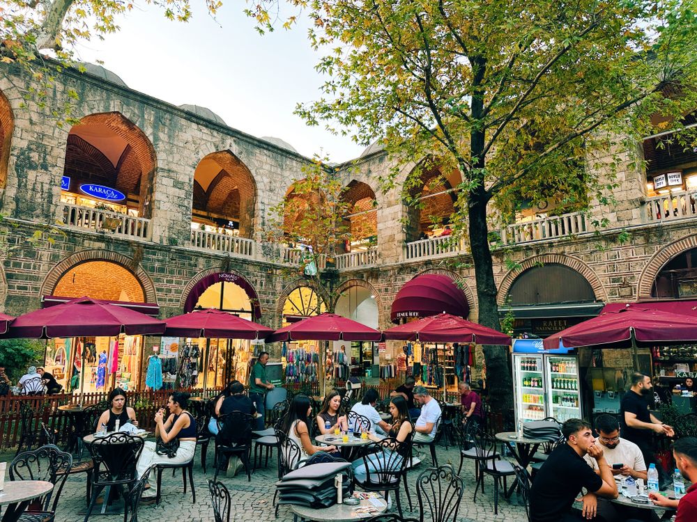 Historic Outdoor Cafe in Vibrant Bazaar Setting · Free Stock Photo