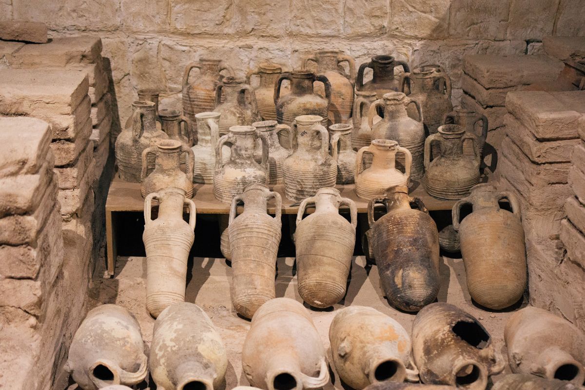 Rows of ancient terracotta vessels