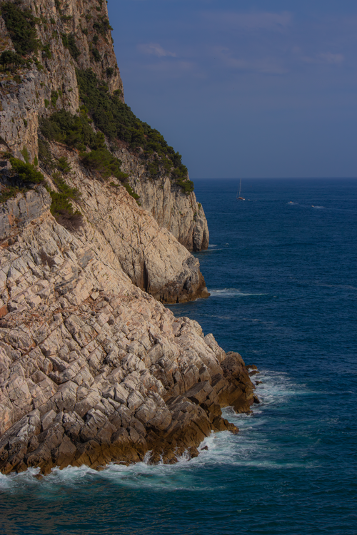 Free Majestic cliffs meet the sea at Porto Venere, Liguria, Italy. Stock Photo