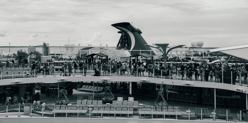 Free Black and white view of a busy cruise ship deck with passengers in The Bahamas. Stock Photo