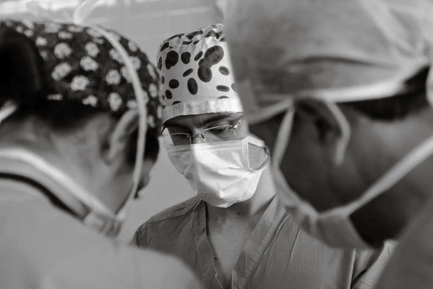 Medical team performing surgery in a hospital operating room