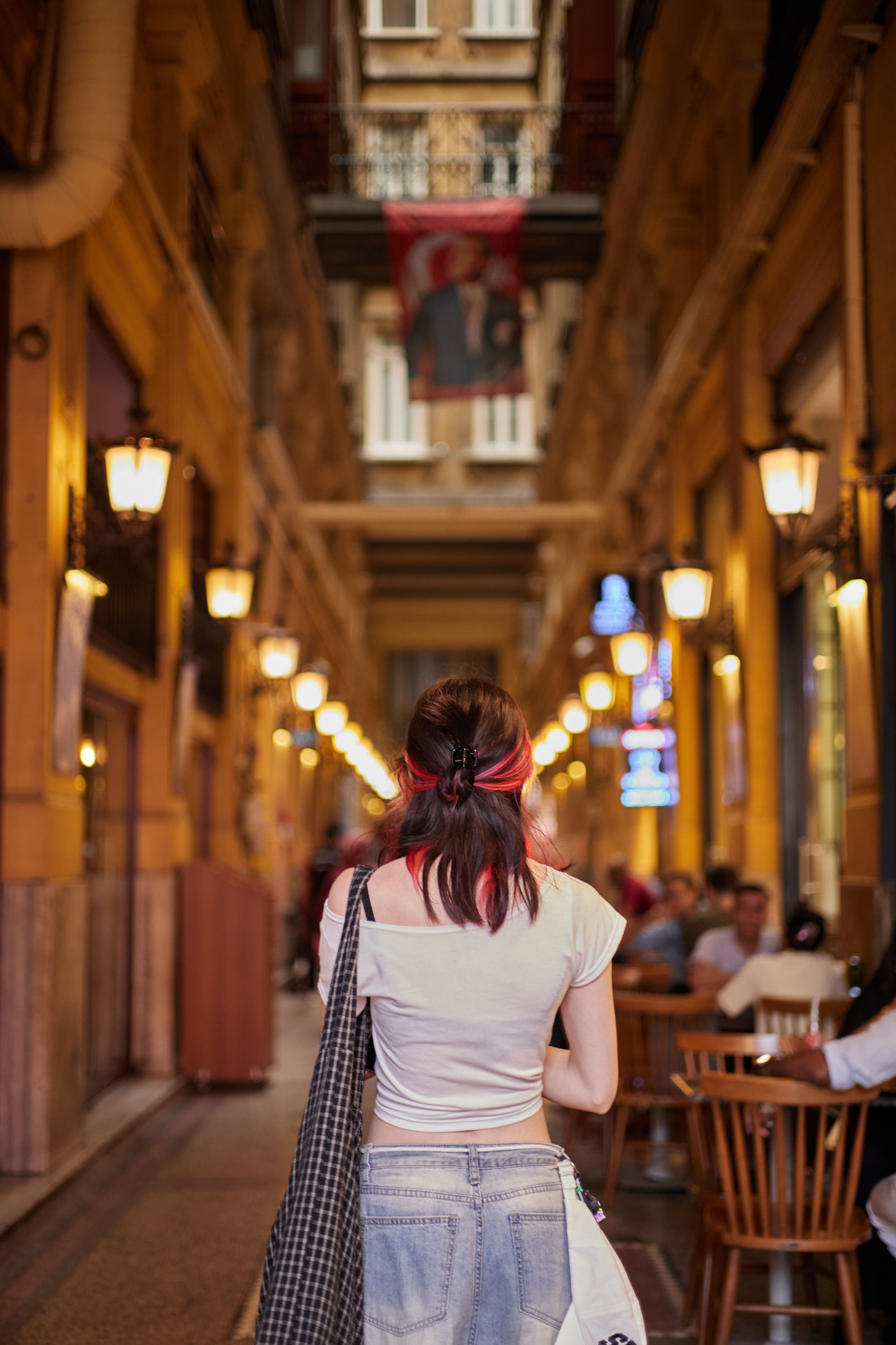 Woman Walking in Historic Istanbul Passageway · Free Stock Photo