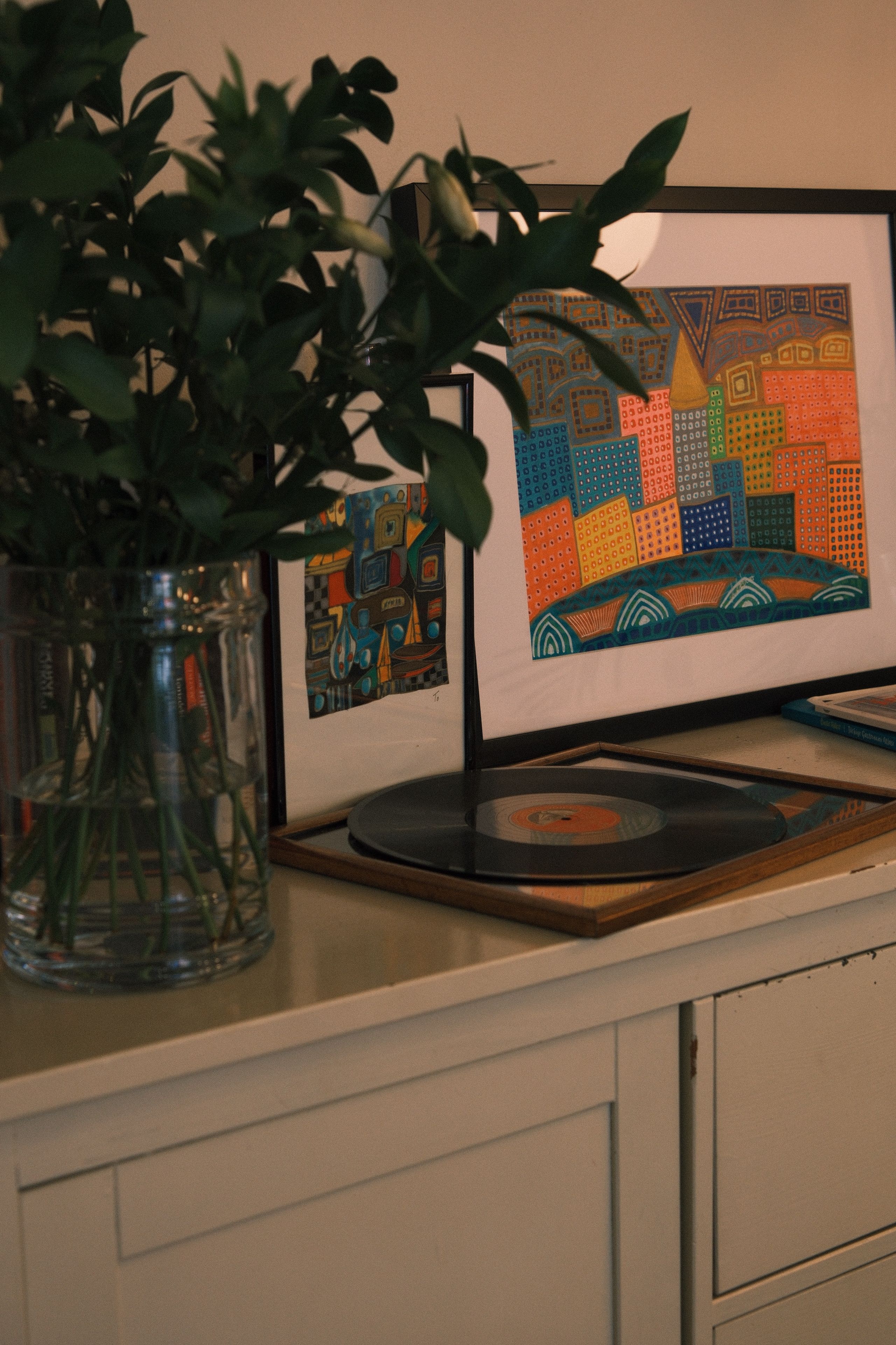 Stylish Interior with Colorful Framed Artwork · Free Stock Photo