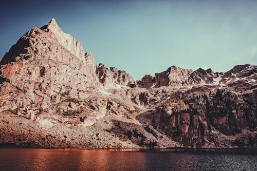 Brown Rocky Mountain Under a Calm Blue Sky