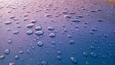 Blue Board With Water Dew Closeup Photography